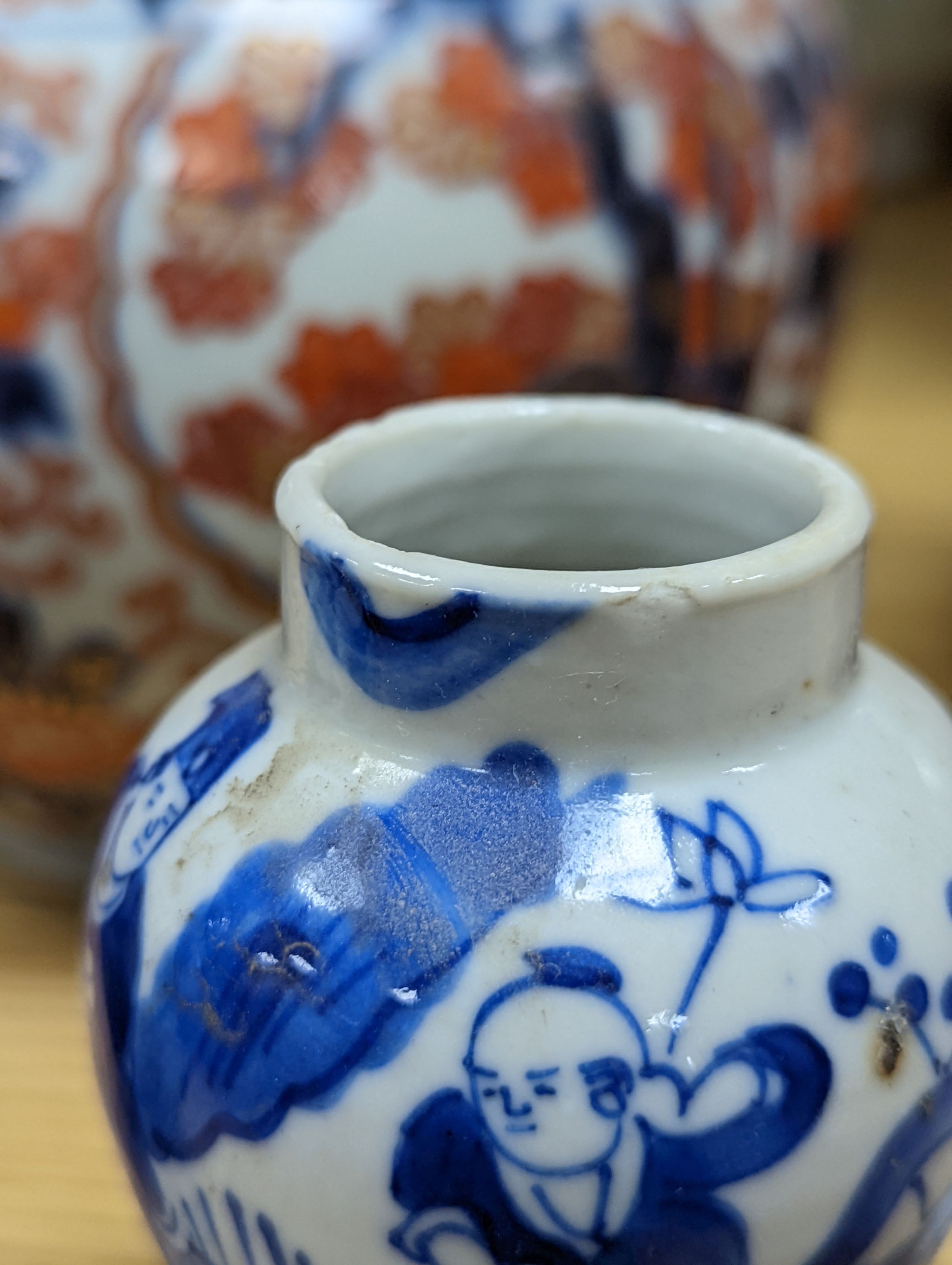 An 18th century Chinese famille rose dish, crackle-glaze stem cup, Beijing glass tea bowl and a Chinese Imari plate. Largest 24cm